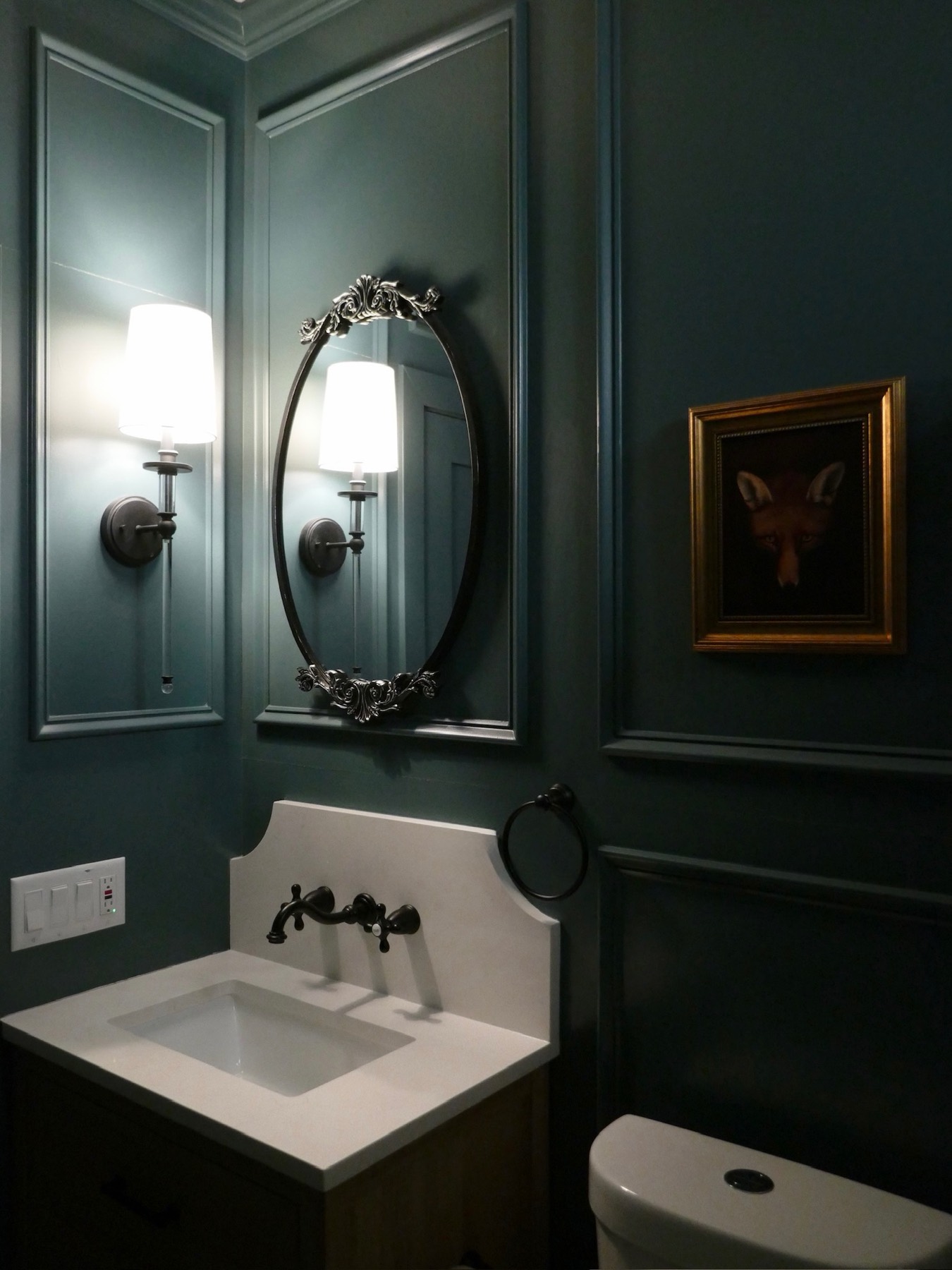 The finished teal powder room